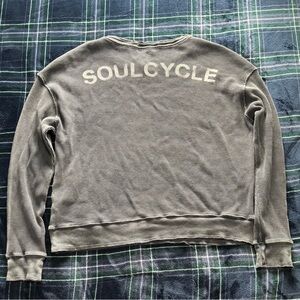 Soul cycle acid wash black knitted long sleeve. Women’s size medium.
